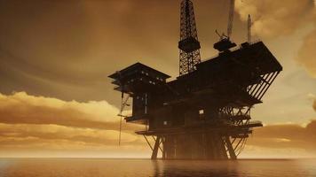 Offshore Jack Up Rig in The Middle of The Sea at Sunset Time video