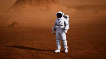 Astronaut on Mars Surface. Red Planet Covered in Gas and rock video