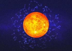 Sun in outer space with zodiac constellations on the background. North and south America. Blue planet. Science fiction. Elements of this image were furnished by NASA photo
