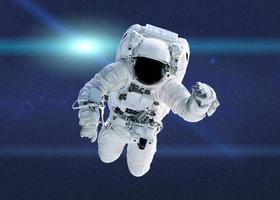 astronauta espacial en el espacio ultraterrestre con destello de lente. fondo de pantalla de ciencia ficción. los elementos de esta ilustración fueron proporcionados por la nasa. foto