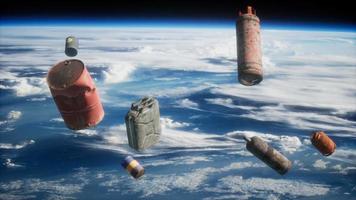 Space debris, pollution of the atmosphere of the planet Earth and space by human waste. Elements furnished by NASA video