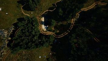 Aerial view of the road through the forest video