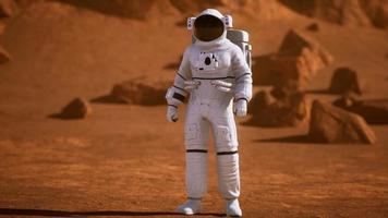 Astronaut on Mars Surface. Red Planet Covered in Gas and rock video