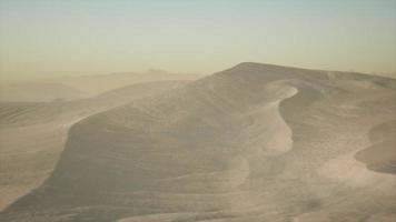 Aerial view on big sand dunes in Sahara desert at sunrise video