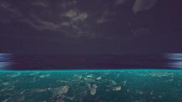 Split view over and under water in the Caribbean sea with clouds video