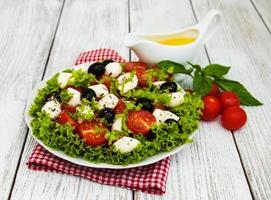 salad with mozarella cheese and vegetables photo