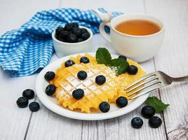 Waffles with blueberries photo