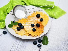 Waffles with blueberries photo