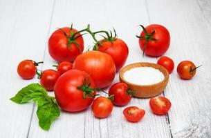 Fresh tomatoes on a table photo