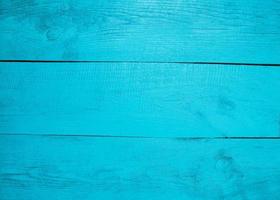 Blue painted wooden background photo