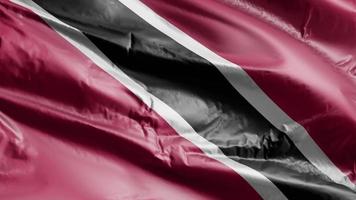 bandeira de trinidad e tobago acenando no loop de vento. bandeira de trinidad e tobago balançando na brisa. fundo de preenchimento completo. loop de 10 segundos. video
