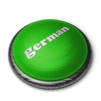 palabra alemana en el botón verde aislado en blanco foto
