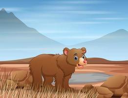 Bear cartoon in dry field vector