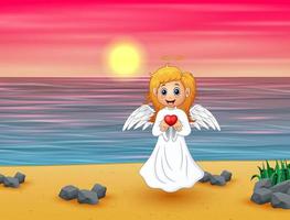 Angel girl present a red heart on the beach