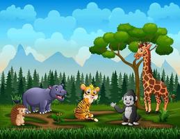 Happy wild animals enjoying in the green field vector