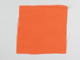 muestra de tela naranja foto