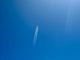 plane trails with copy space photo