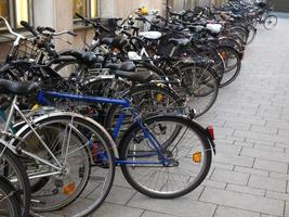 Row of parked bikes photo