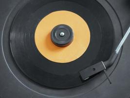Vinyl record on turntable photo