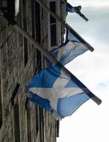 Scotland flag over blue sky photo