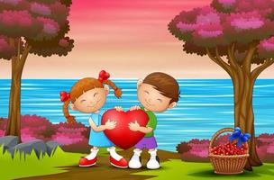 A couple kid holding a heart on nature background vector