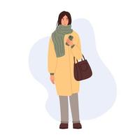 una mujer joven en ropa de invierno con un teléfono móvil. chica de estilo callejero. gente con estilo en ropa de moda. ilustración vectorial plana vector