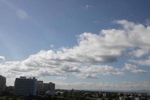 Air clouds in the blue sky photo