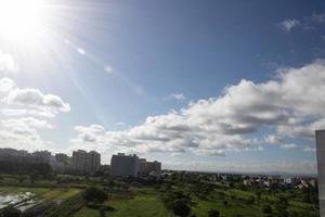 Air clouds in the blue sky photo