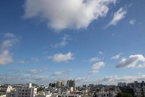 Air clouds in the blue sky photo