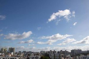 Air clouds in the blue sky photo