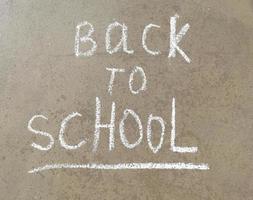 chalk lettering on the blackboard back to school. training, the beginning school year photo