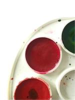 Red, orange, green watercolor paints isolated on a white background. photo