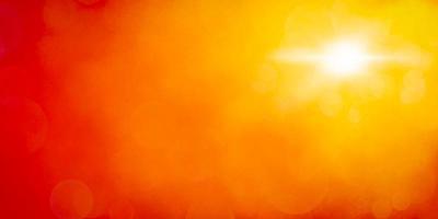 abstract orange backgroundand summer background with light bokeh photo