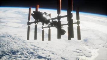 A view of the Earth and a spaceship. ISS is orbiting the Earth video