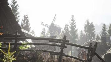 old traditional wooden windmill in the forest video