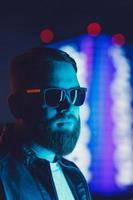 portrait of young bearded man in sunglasses photo