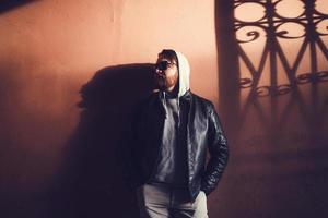 young man in leather jacket photo