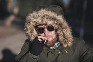 man smoking a cigarette photo