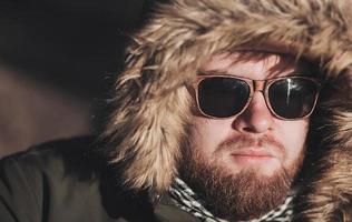 man wearing winter alaska jacket photo