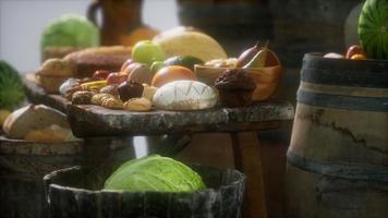 food table with wine barrels and some fruits, vegetables and bread video