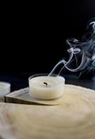 candle with smoke trailing photo