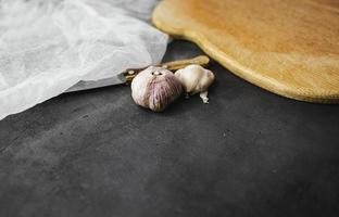 Garlic bulbs on table.