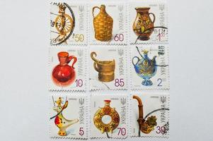 Collection of postage stamps printed in Ukraine, shows pottery, circa 2000 photo