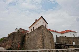 Castle Palanok in Mukachevo, Ukraine at transcarpathian region of Europe photo