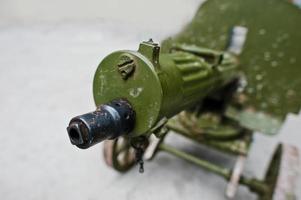 antigua ametralladora vintage, sistema de maxim. pistola máxima foto