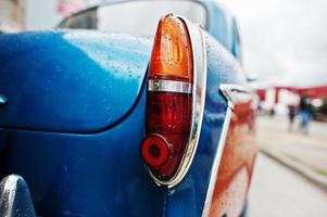 Old vintage car back headlight. photo