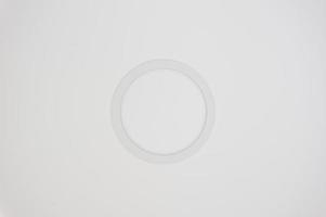 White round LED lamp at ceiling. Circle centered photo