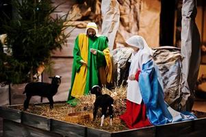 Very large christmas nativity crib. Jesus in the manger. Holy family photo