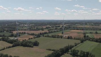 4K Real-time video Sequence of Carentan, France - The wind turbines in the countryside of Normandy