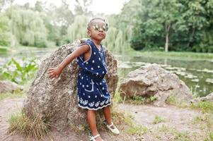 Cute african american baby girl at sunglasses photo